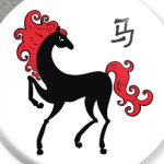 Чёрная лошадь с красной гривой