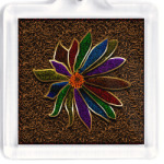 Разноцветный цветок на фоне медной проволоки