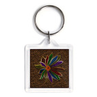 Разноцветный цветок на фоне медной проволоки